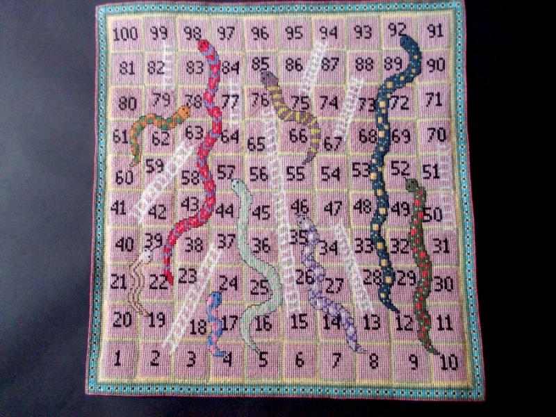 Gesticktes Spiel in Kreuzstich Schlangen und Leitern