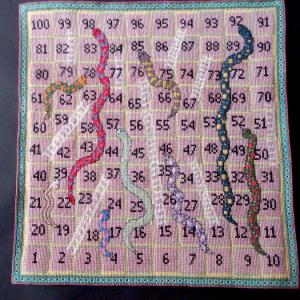 Gesticktes Spiel in Kreuzstich Schlangen und Leitern